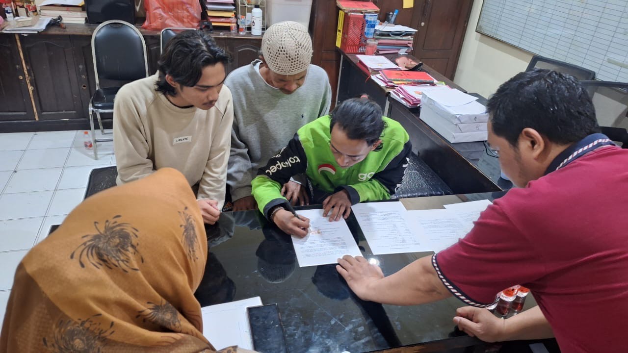 Polsek Sukun memediasi kesalahpahaman antara Jukir dan Driver Ojol yang sempat viral di media sosial (Istimewa)